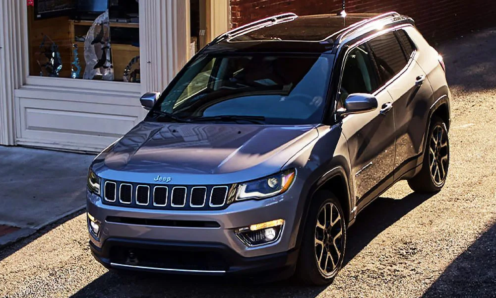 A 2021 Jeep Compass on a street corner