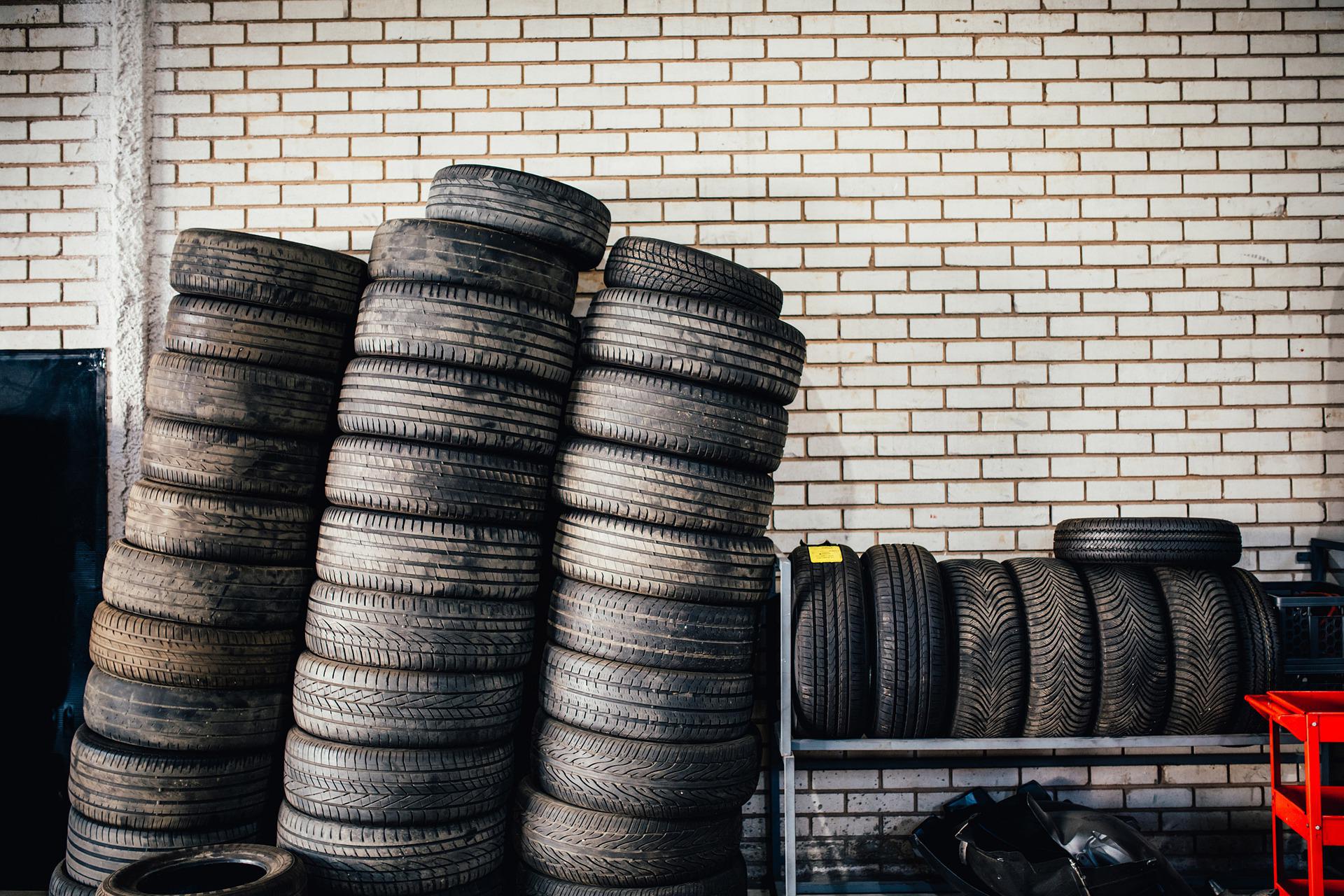 A stack of tires in an auto garage