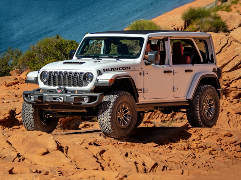 A 2024 Jeep Wrangler off-roading in the desert