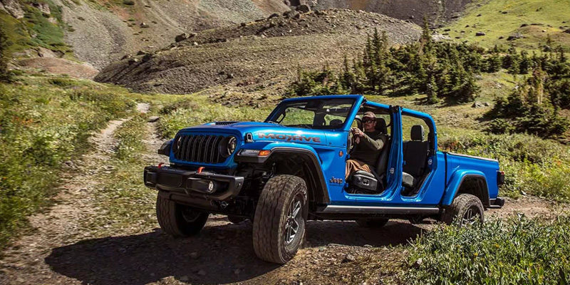 Blue Jeep Gladiator Mojave off-roading.